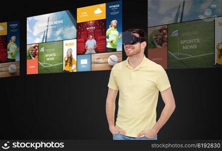 3d technology, virtual reality, mass media, entertainment and people concept - happy young man in virtual reality headset or 3d glasses with screens projection over black background