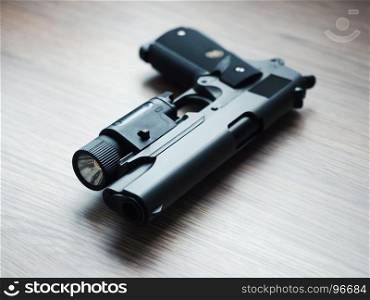 .45 ACP caliber tactical custom build pistol, shallow depth of field