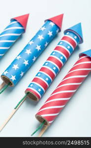 4th of july USA flag colors style rockets fireworks on blue background. Independence day firecrackers.