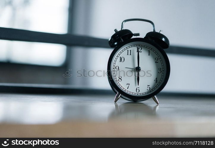 6 o'clock retro clock vintage, retro alarm clock on table, time concept with copy space