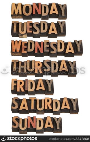 7 days of week from Monday to Sunday in vintage wood letterpress printing blocks, isolated on white