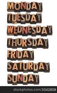 7 days of week from Monday to Sunday in vintage wood letterpress printing blocks, isolated on white