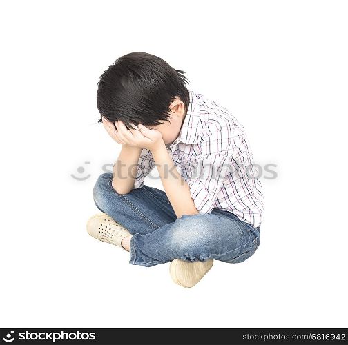 7 years old Asian boy is feeling disappoint isolated over white