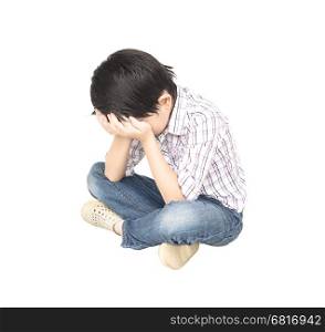 7 years old Asian boy is feeling disappoint isolated over white