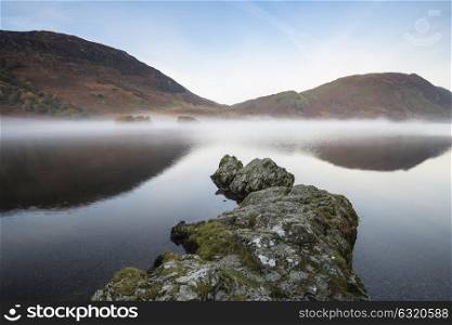 71944718 - stunning autumn fall landscape image of crummock water at sunrise in lake district england