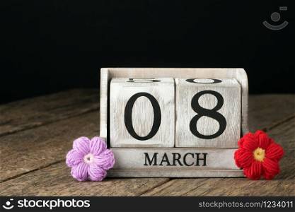 8 March Happy Women&rsquo;s Day message with wooden block calendar