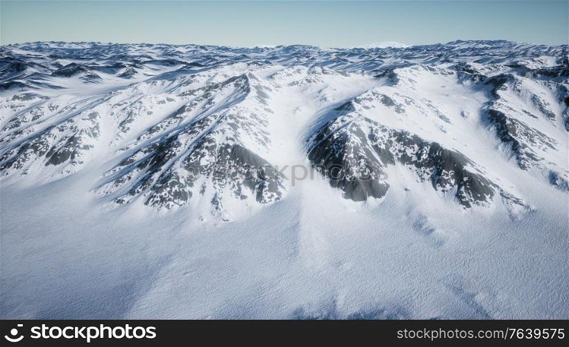 8K Aerial Landscape of snowy mountains and icy shores in Antarctica