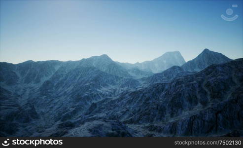 8K aerial mountain landscape in high altitude with rays of light. 8K Aerial Mountain Landscape in High Altitude