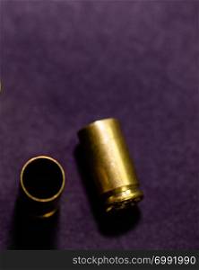 9mm Bullet casings on black background