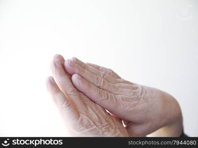 a 70-year old man&rsquo;s hands