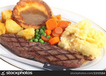 A &acute;pub-grub&acute; style dinner of steak, mixed veg, roasted and mashed potatoes, yorkshire pudding and gravy,