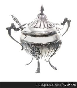 a antique silver sugar bowl on a white background