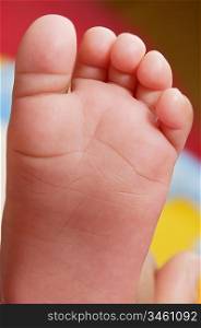 a baby foot a over colors background