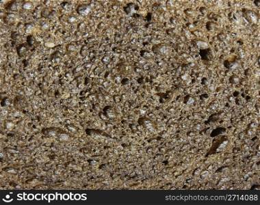 A background of a close-up of pumpernickel bread.. Pumpernickel Background