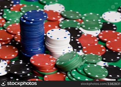 A background with casino chips of many colors