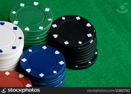 A background with poker chips and green felt