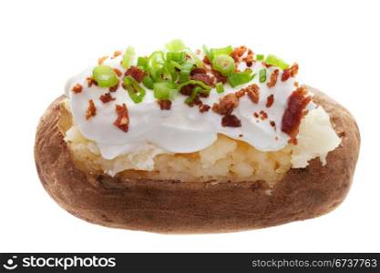 A baked potato with sour cream, bacon bits, and Green onions