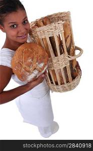 A baker showing off her bread