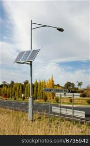 A bank of solar panels providing power for a street light