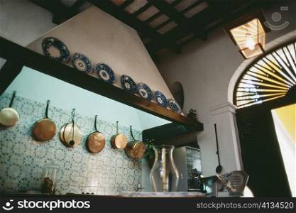 A bar adorned cooking pans and plates, Old San Juan, Puerto Rico