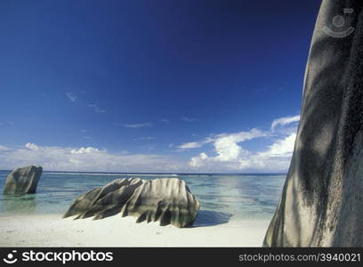 a Beach on the coast if the Island La Digue of the seychelles islands in the indian ocean. INDIAN OCEAN SEYCHELLES LA DIGUE BEACH