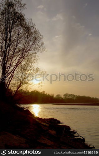 A Beatiful sunset over the side of a river