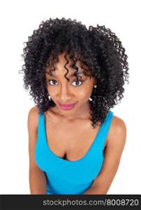 A beautiful African American woman in portrait with curly black hairstanding from the front, isolated for white background.
