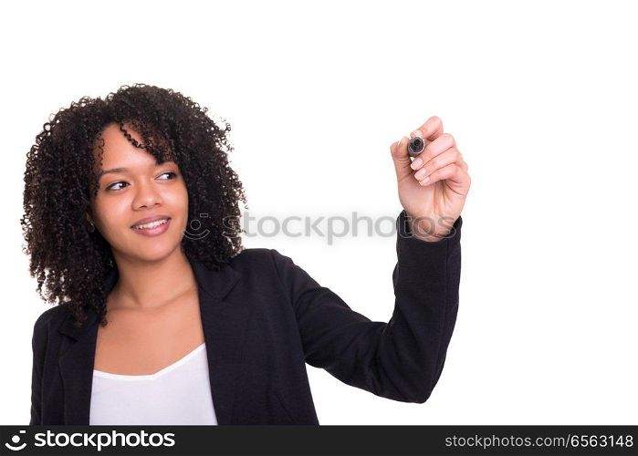 A beautiful african business woman writing with marker on virtual screen, isolated over white