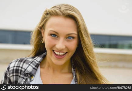 A beautiful and young girl smiling 