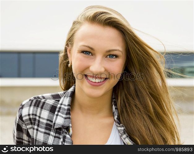 A beautiful and young girl smiling