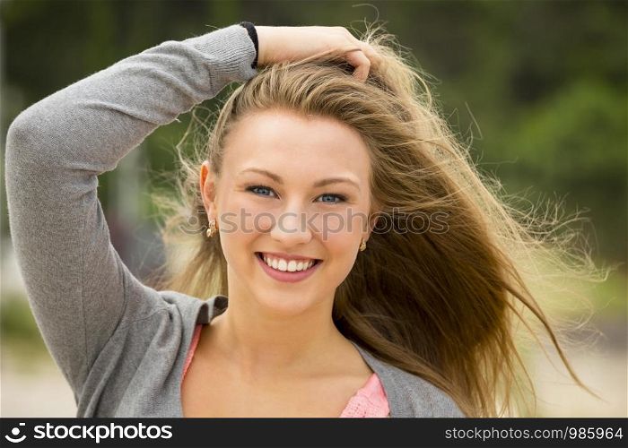 A beautiful and young girl smiling