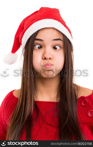 A beautiful asian woman with a christmas hat making a silly expression