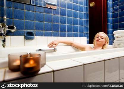 A beautiful blond in an original 1920s style spa and bath