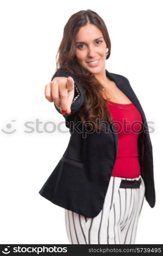 A beautiful business woman pointing at you, isolated over white