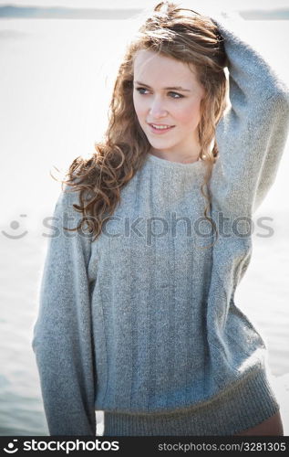 A beautiful caucasian girl outdoor on the beach during summer