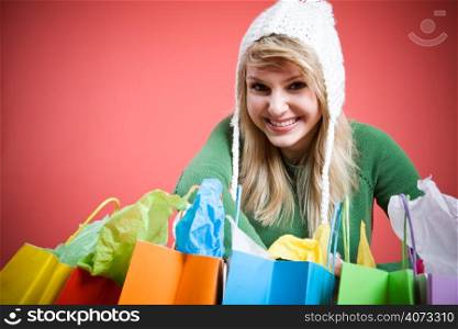 A beautiful caucasian girl with shopping bags