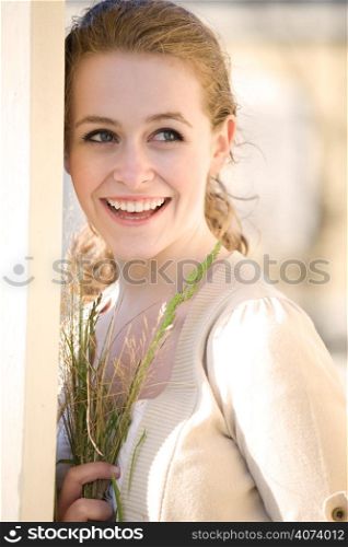 A beautiful caucasian teenage girl outdoor in summer