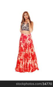 A beautiful Caucasian woman standing isolated for white backgroundin a long red skirt and black top.