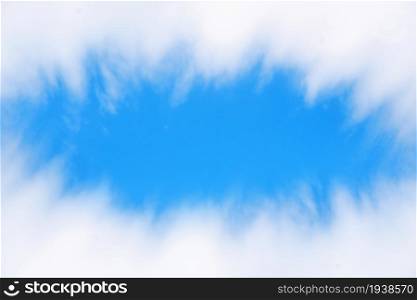 A beautiful, colorful sky surrounded by white clouds. suitable for entering text
