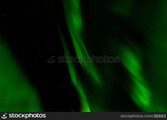 A beautiful green Aurora borealis or northern lights, Norway
