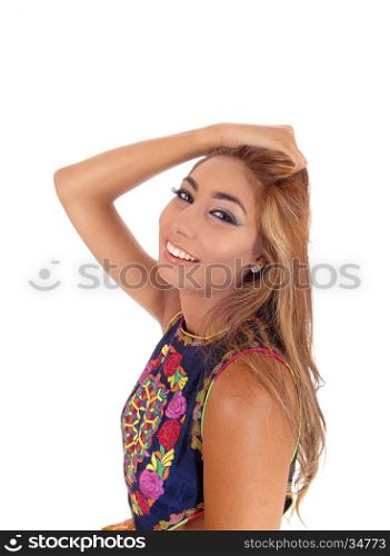 A beautiful happy woman with one hand on her head in a profileportrait, isolated for white background.