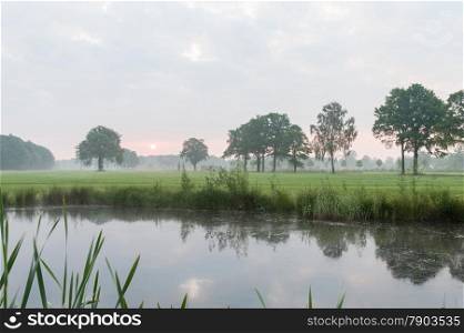 A beautiful misty sunrise in the Dutch countryside