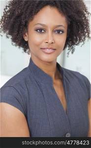 A beautiful mixed race African American young woman or businesswoman