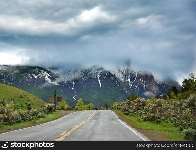 A Beautiful Mountain Landscape With Dramatic Sky And Road