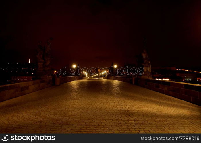 a beautiful night view of the Charles Bridge in Prague