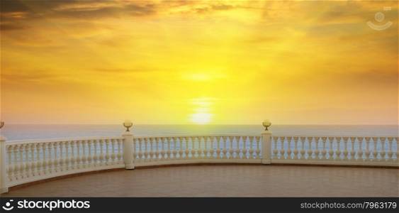 a beautiful promenade and the sunrise over the sea