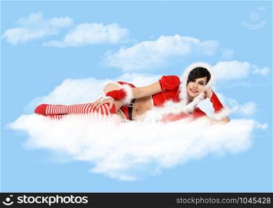 a beautiful santa claus woman lying on the cloud