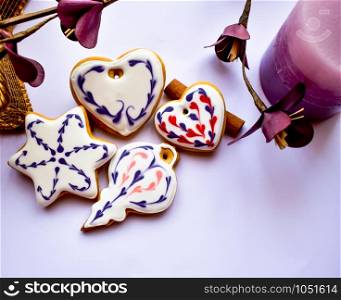 A beautiful selection of traditionally decorated gingerbread cookies perfect for hanging on the christmastree