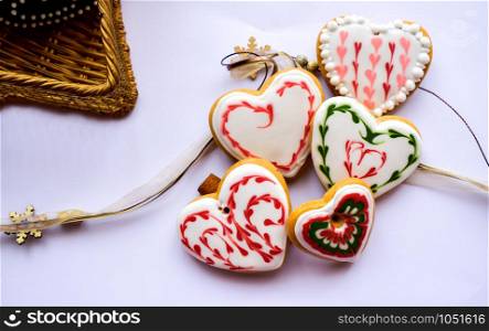 A beautiful selection of traditionally decorated gingerbread cookies perfect for hanging on the christmastree