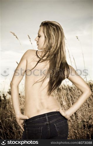 A beautiful sexy caucasian woman enjoying summer outdoor